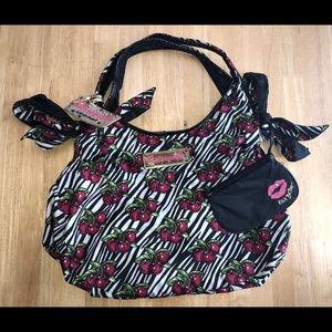 Betsey Johnson reversible zebra cherry/black purse